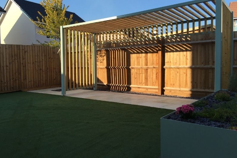 A pergola attached to the main house